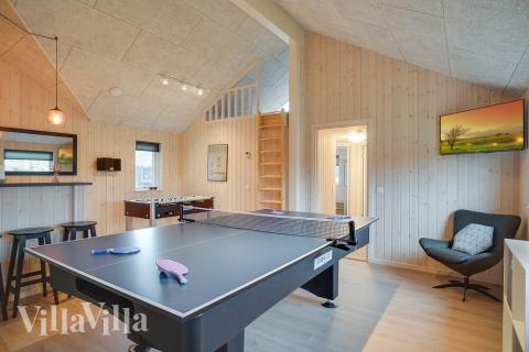 Neben den vielen schönen Stunden, die man im Poolbereich des Hauses verbringen kann, bietet das Luxusferienhaus 723 auch Spielevergnügen bei Billard/Tischtennis und Darts