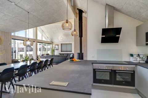 Aufenthaltsraum mit Platz für 16 im Luxusferienhaus Nr. 716.