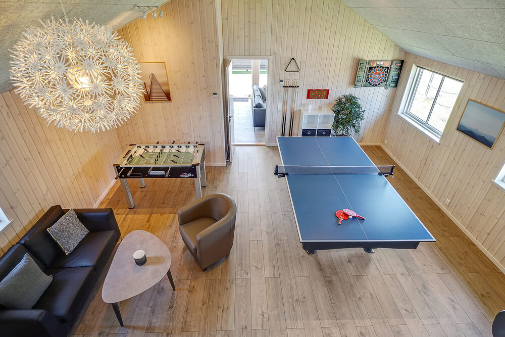 Neben den vielen schönen Stunden, die man im Poolbereich des Hauses verbringen kann, bietet das Luxusferienhaus 716 auch Spielevergnügen bei Billard/Tischtennis und Darts