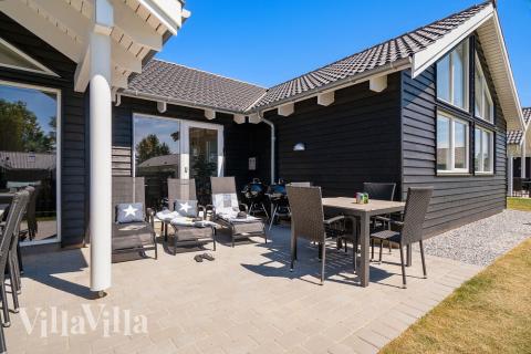 Das Luxusferienhaus Nr. 716 hat eine tolle Terrasse, die mit hochwertigen Gartenmöbeln für 16 Personen ausgestattet ist.