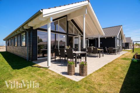 Genießen Sie einen Grillabend auf der Terrasse des Luxusferienhauses Nr. 716 in Deutschland