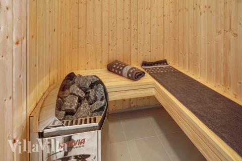 Genießen Sie die heiße Sauna im Luxusferienhaus Nr. 722 für 10 Personen