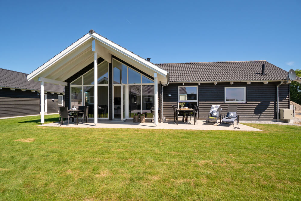 Genießen Sie einen Grillabend auf der Terrasse des Luxusferienhauses Nr. 718 in Deutschland