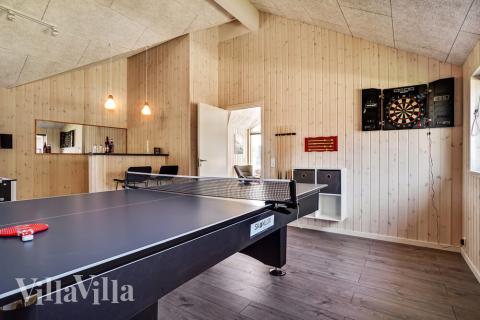 Aktivitätsraum im Luxusferienhaus Nr. 718 mit 4 Schlafzimmern und Platz für 12 Gäste.