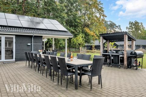 Genießen Sie einen Grillabend auf der Terrasse des Luxusferienhauses Nr. 438 in Nordseeland