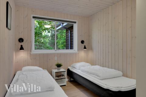 Eines der 12 Schlafzimmer im Luxusferienhaus Nr. 438