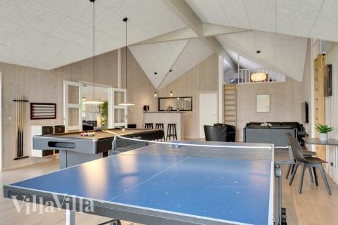 Aktivitätsraum im Luxusferienhaus Nr. 438 mit 12 Schlafzimmern und Platz für 30 Gäste.