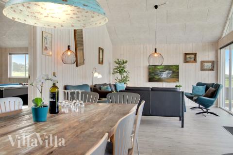 Aufenthaltsraum mit Platz für 14 im Luxusferienhaus Nr. 424.