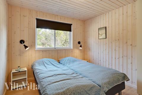 Eines der 9 Schlafzimmer im Luxusferienhaus Nr. 439