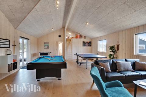 Neben den vielen schönen Stunden, die man im Poolbereich des Hauses verbringen kann, bietet das Luxusferienhaus 439 auch Spielevergnügen bei Billard/Tischtennis und Darts