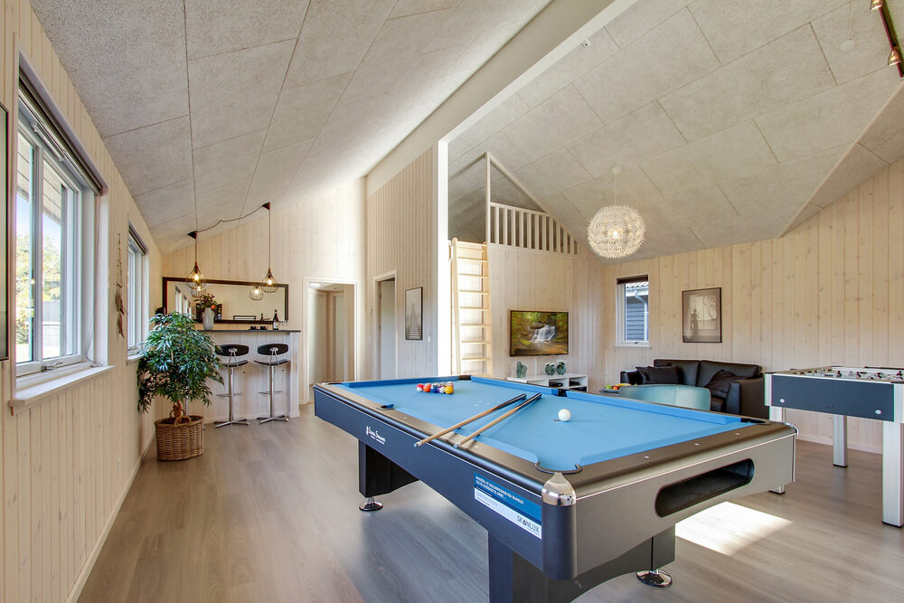 Neben den vielen schönen Stunden, die man im Poolbereich des Hauses verbringen kann, bietet das Luxusferienhaus 435 auch Spielevergnügen bei Billard/Tischtennis und Darts