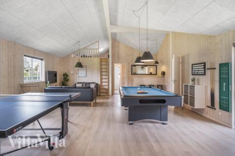 Aktivitätsraum im Luxusferienhaus Nr. 440 mit 9 Schlafzimmern und Platz für 24 Gäste.