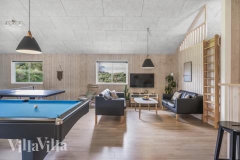 Neben den vielen schönen Stunden, die man im Poolbereich des Hauses verbringen kann, bietet das Luxusferienhaus 440 auch Spielevergnügen bei Billard/Tischtennis und Darts