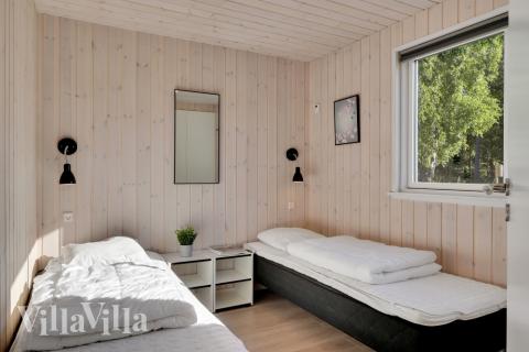 Eines der 12 Schlafzimmer im Luxusferienhaus Nr. 436