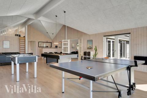 Neben den vielen schönen Stunden, die man im Poolbereich des Hauses verbringen kann, bietet das Luxusferienhaus 436 auch Spielevergnügen bei Billard/Tischtennis und Darts