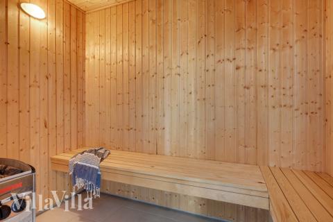 Genießen Sie die heiße Sauna im Luxusferienhaus Nr. 436 für 30 Personen