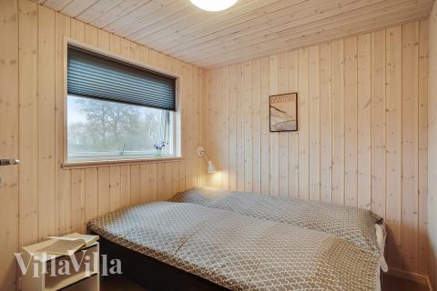 Eines der 4 Schlafzimmer im Luxusferienhaus Nr. 719