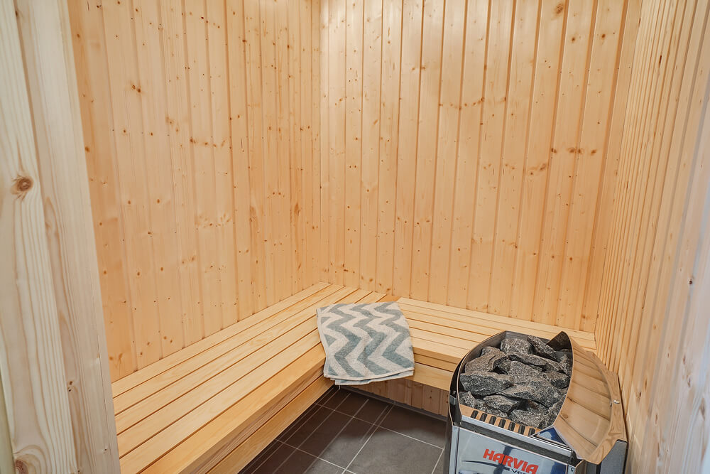 Genießen Sie die heiße Sauna im Luxusferienhaus Nr. 725 für 10 Personen