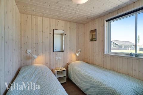 Eines der 7 Schlafzimmer im Luxusferienhaus Nr. 720