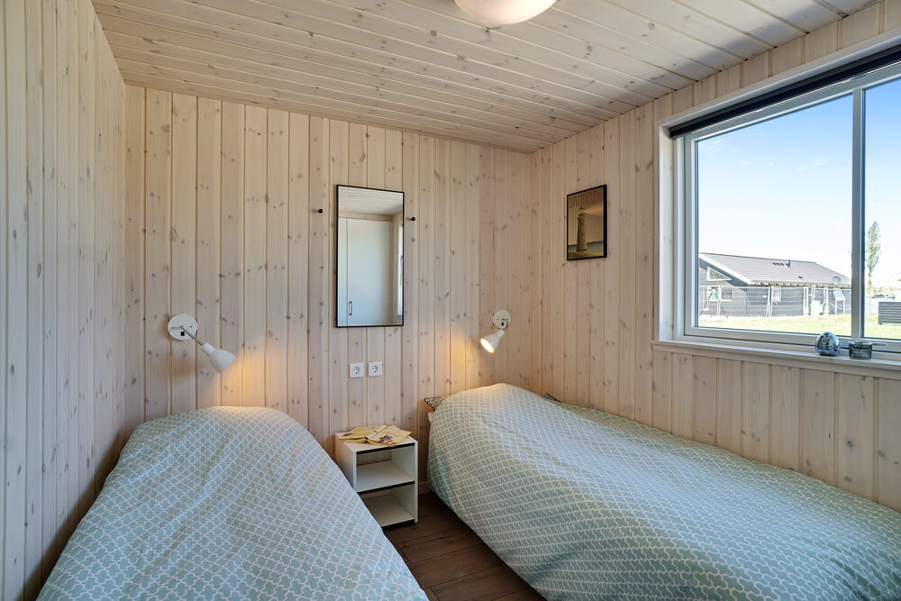 Eines der 7 Schlafzimmer im Luxusferienhaus Nr. 720