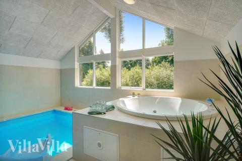 Genießen Sie den warmen Whirlpool im Luxusferienhaus Nr. 720 in Deutschland