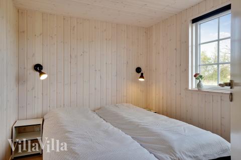 Eines der 10 Schlafzimmer im Luxusferienhaus Nr. 442