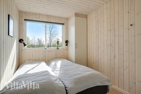 Eines der 10 Schlafzimmer im Luxusferienhaus Nr. 441