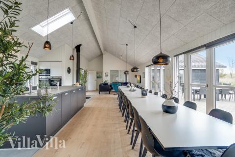 Der Aufenthaltsraum bietet Platz für 26 Personen, wenn ihr das Ferienhaus 441 in Ostjütland besucht.