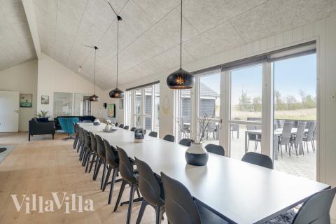 Aufenthaltsraum mit Platz für 26 im Luxusferienhaus Nr. 441.