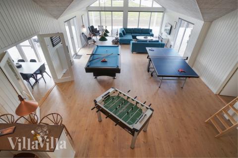 Neben den vielen schönen Stunden, die man im Poolbereich des Hauses verbringen kann, bietet das Luxusferienhaus 441 auch Spielevergnügen bei Billard/Tischtennis und Darts