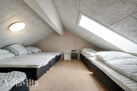 Der große ausgebaute Dachboden im Luxusferienhaus Nr. 441 für 26 Personen