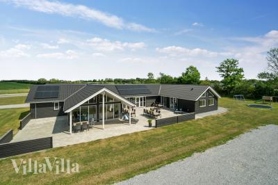 Dieses schöne Poolhaus Nr. 441 mit Platz für 26 Personen liegt in Ostjütland