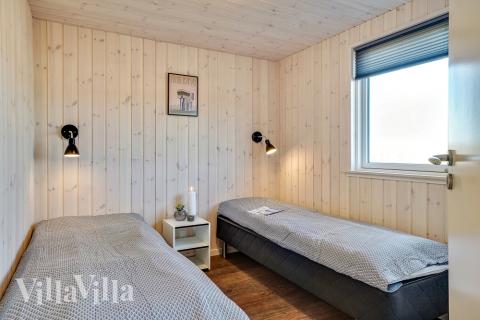 Eines der 12 Schlafzimmer im Luxusferienhaus Nr. 446