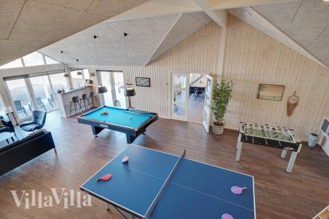 Neben den vielen schönen Stunden, die man im Poolbereich des Hauses verbringen kann, bietet das Luxusferienhaus 450 auch Spielevergnügen bei Billard/Tischtennis und Darts