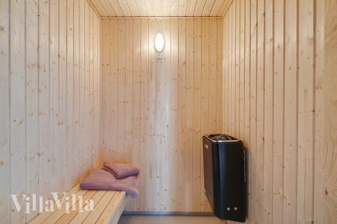 Genießen Sie die heiße Sauna im Luxusferienhaus Nr. 450 für 30 Personen