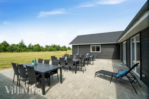 Das Luxusferienhaus Nr. 450 hat eine tolle Terrasse, die mit hochwertigen Gartenmöbeln für 30 Personen ausgestattet ist.