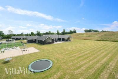 Dieses schöne Poolhaus Nr. 450 mit Platz für 30 Personen liegt in Ostjütland
