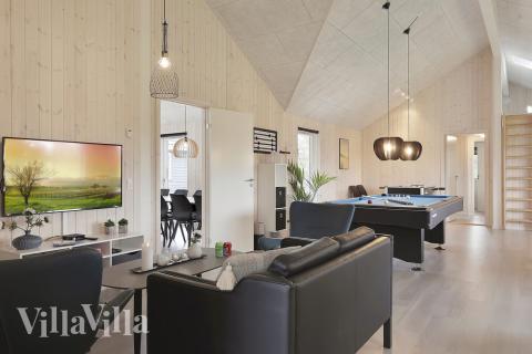 Das Luxusferienhaus 432 für 20 Personen hat einen großen Aktivitätsraum mit u. a. Billard und Darts