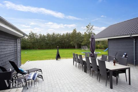 Das Luxusferienhaus Nr. 432 hat eine tolle Terrasse, die mit hochwertigen Gartenmöbeln für 20 Personen ausgestattet ist.