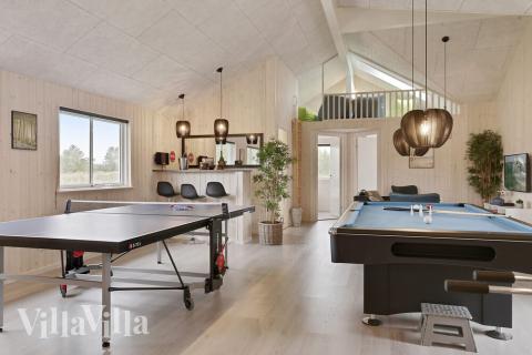 Neben den vielen schönen Stunden, die man im Poolbereich des Hauses verbringen kann, bietet das Luxusferienhaus 432 auch Spielevergnügen bei Billard/Tischtennis und Darts