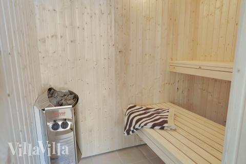 Genießen Sie die heiße Sauna im Luxusferienhaus Nr. 433 für 16 Personen