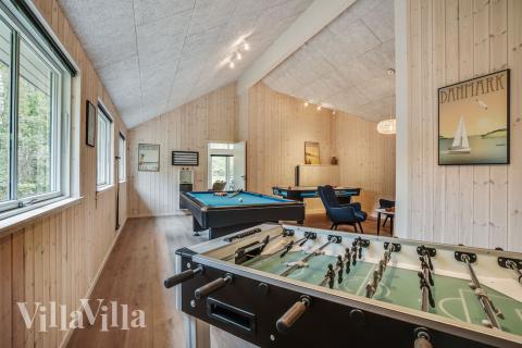 Neben den vielen schönen Stunden, die man im Poolbereich des Hauses verbringen kann, bietet das Luxusferienhaus 434 auch Spielevergnügen bei Billard/Tischtennis und Darts