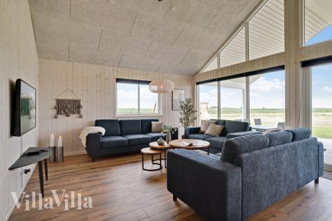 Aufenthaltsraum mit Platz für 18 im Luxusferienhaus Nr. 437.