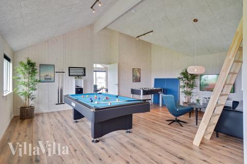 Neben den vielen schönen Stunden, die man im Poolbereich des Hauses verbringen kann, bietet das Luxusferienhaus 437 auch Spielevergnügen bei Billard/Tischtennis und Darts