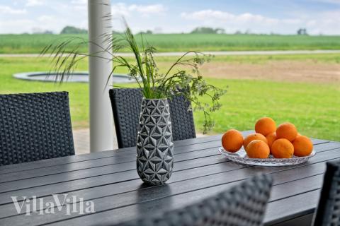 Genießen Sie einen Grillabend auf der Terrasse des Luxusferienhauses Nr. 437 in Fünen und seine Inseln