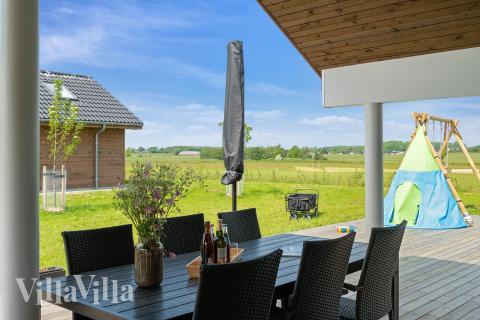 Das Luxusferienhaus Nr. 443 hat eine tolle Terrasse, die mit hochwertigen Gartenmöbeln für 10 Personen ausgestattet ist.