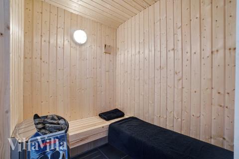 Genießen Sie die heiße Sauna im Luxusferienhaus Nr. 444 für 12 Personen