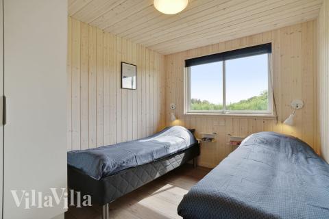 Eines der 8 Schlafzimmer im Luxusferienhaus Nr. 453