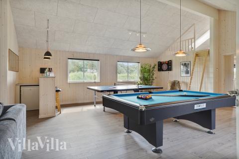 Aktivitätsraum im Luxusferienhaus Nr. 453 mit 8 Schlafzimmern und Platz für 20 Gäste.
