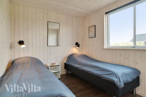 Eines der 12 Schlafzimmer im Luxusferienhaus Nr. 454